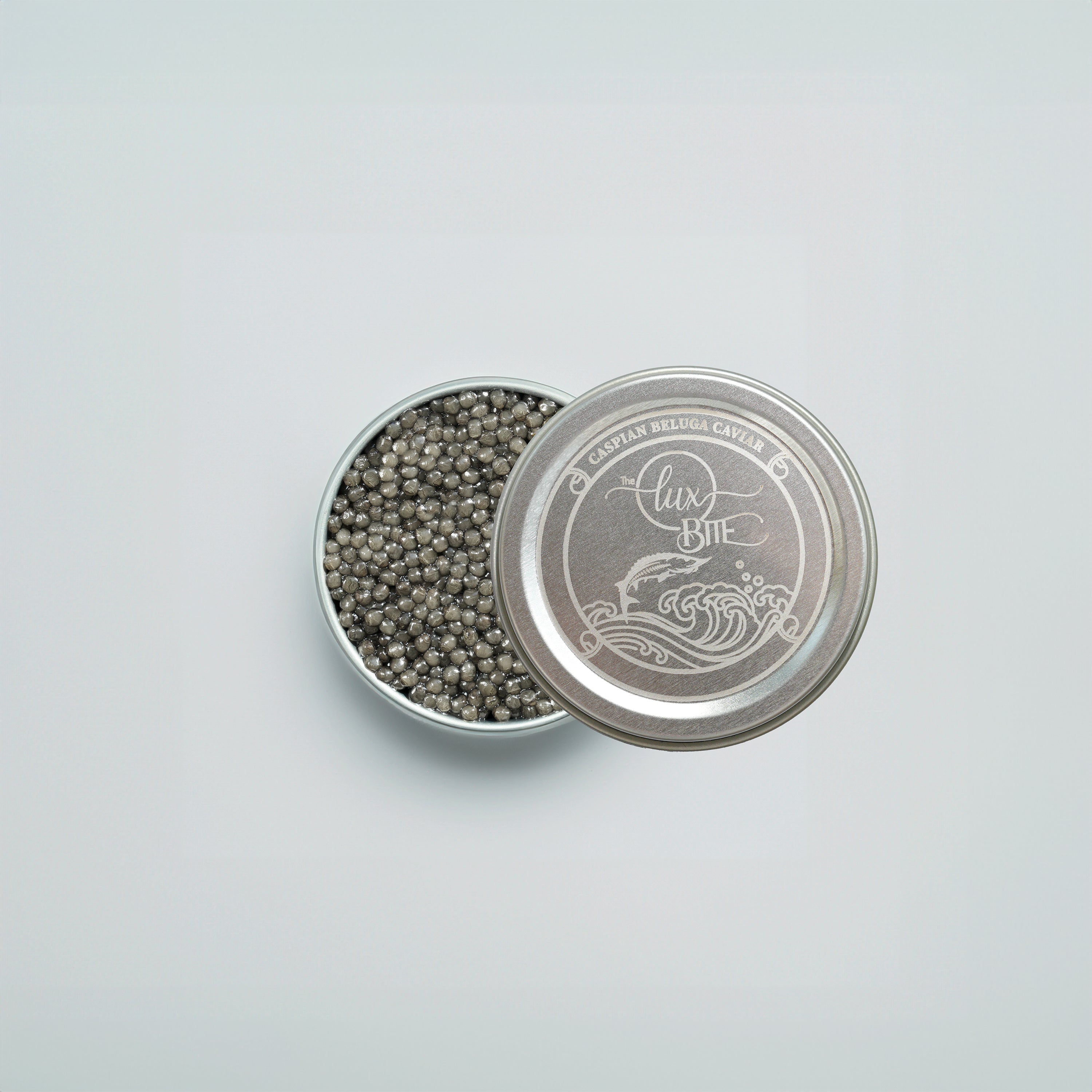 silver-caviar-with-tin-white-background-2_d91f4e4a-d14f-45e4-8542-997d70bc0e4f.jpg